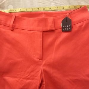 Coral colored Shin Choi belted coral pants